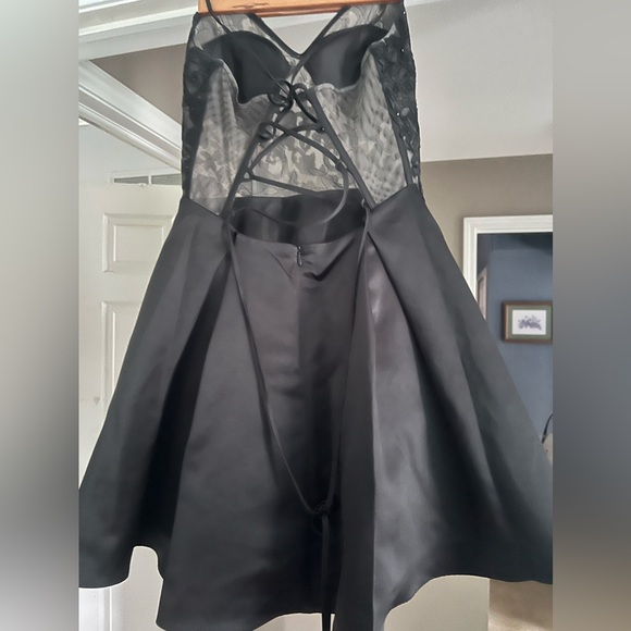 Short Black Corset dress. It was pockets and it is so comfy to wear. - Picture 2 of 5